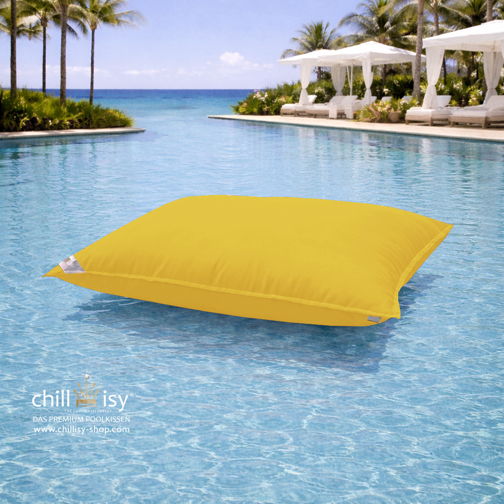 Premium Poolkissen Maxi 190x130 cm von chillisy in Gelb im Pool mit Meeranschluss treibend.